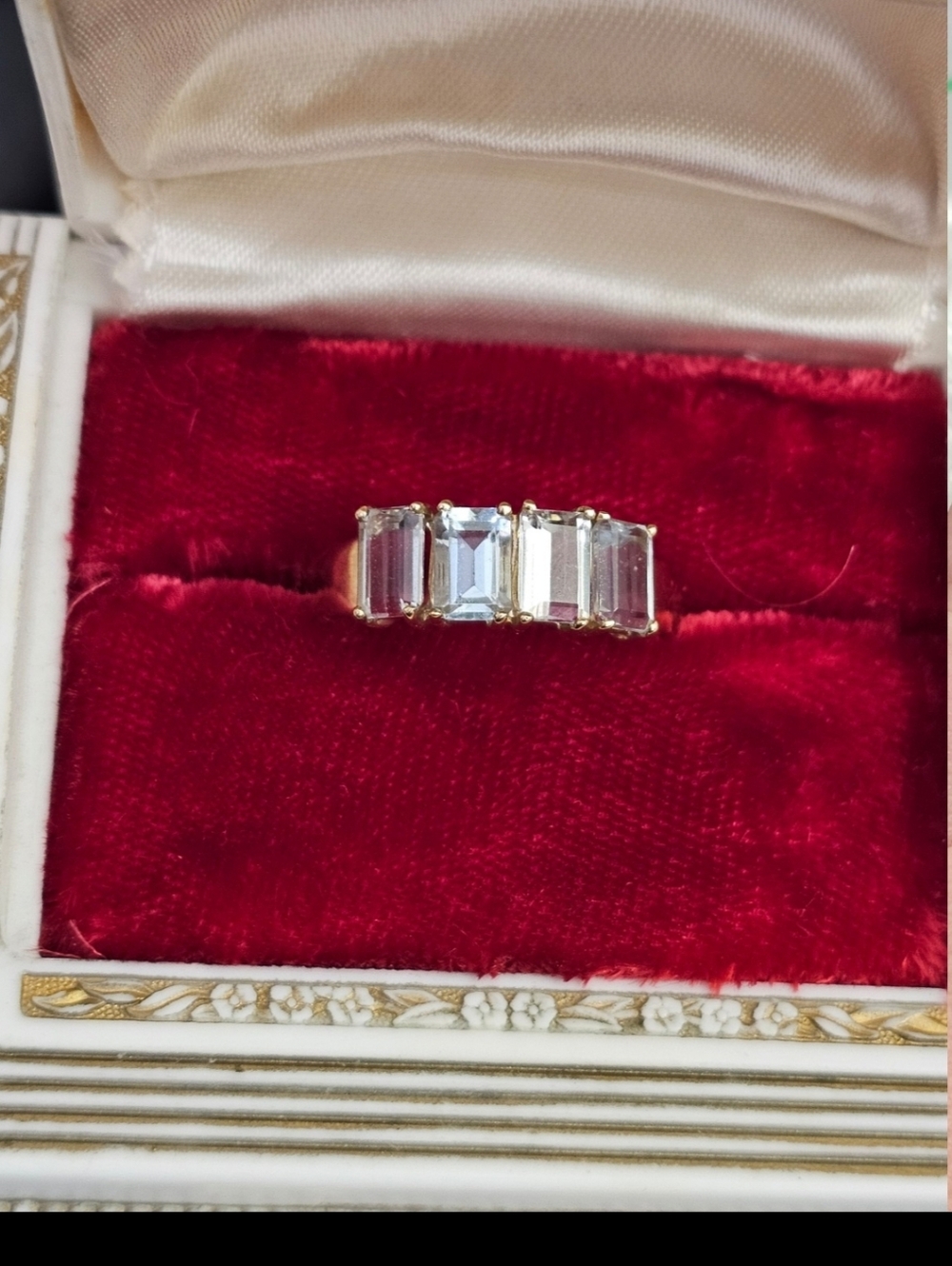 10k baguette cut blue topaz ring size 10. Resizeable by a jeweler. Stamped 10k.